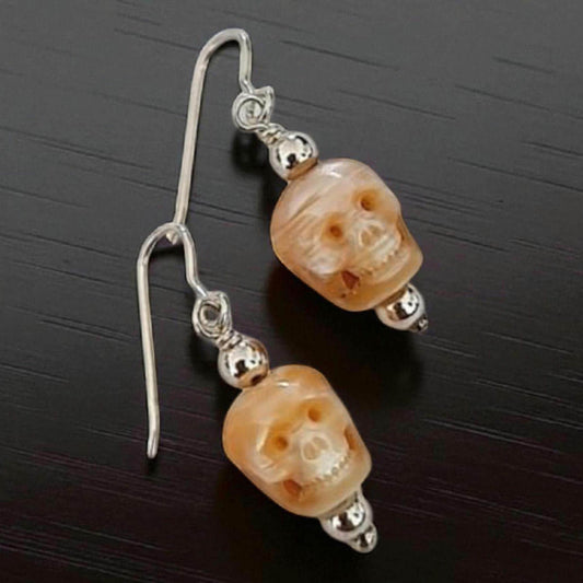 Carved natural Pearl Skull dangle Earrings: handmade Sterling Silver